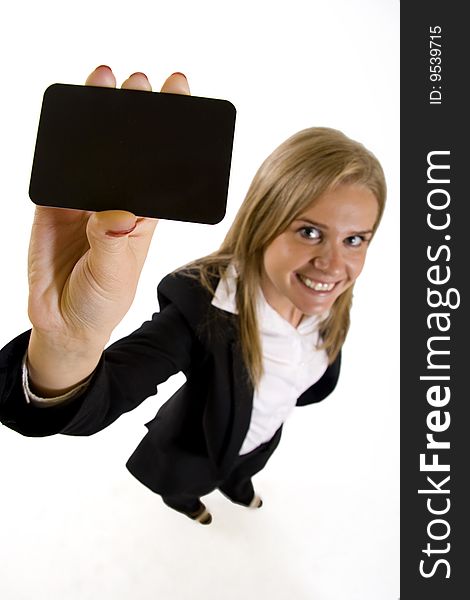 Wide angle picture of an attractive businesswoman presenting a blank card