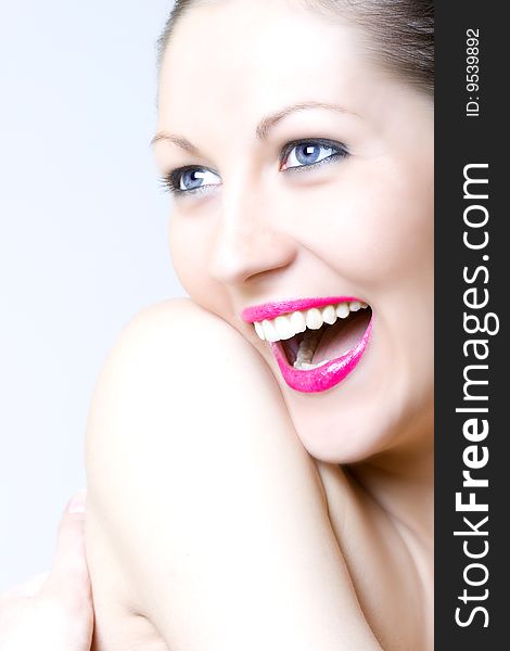 Closeup of an attractive woman laughing. Closeup of an attractive woman laughing