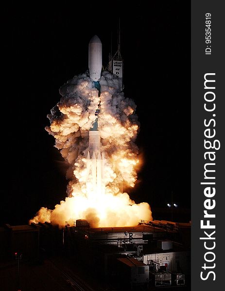 Night launch of NASA space shuttle from pad. Night launch of NASA space shuttle from pad.