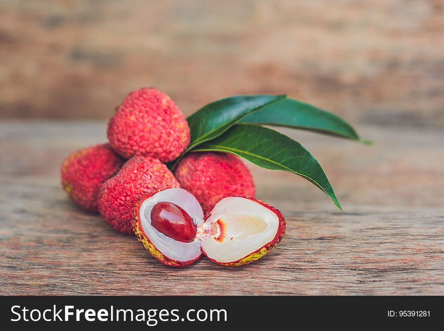 Fresh Litchi Fruit On An Old Wooden Background