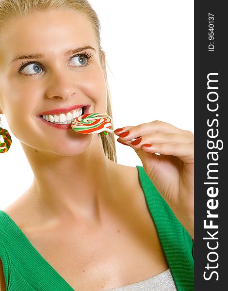 Woman Sucking On A Lolly Pop And Smiling