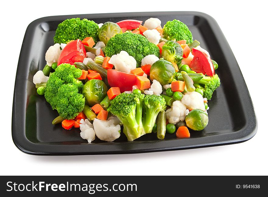 Vegetables: cauliflower, brussels sprouts, broccoli, carrots, string beans and tomatoes. Vegetables: cauliflower, brussels sprouts, broccoli, carrots, string beans and tomatoes