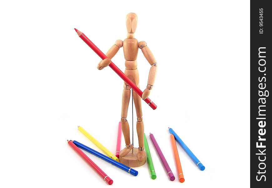 Wooden artist mannequin holding a red colored pencil.