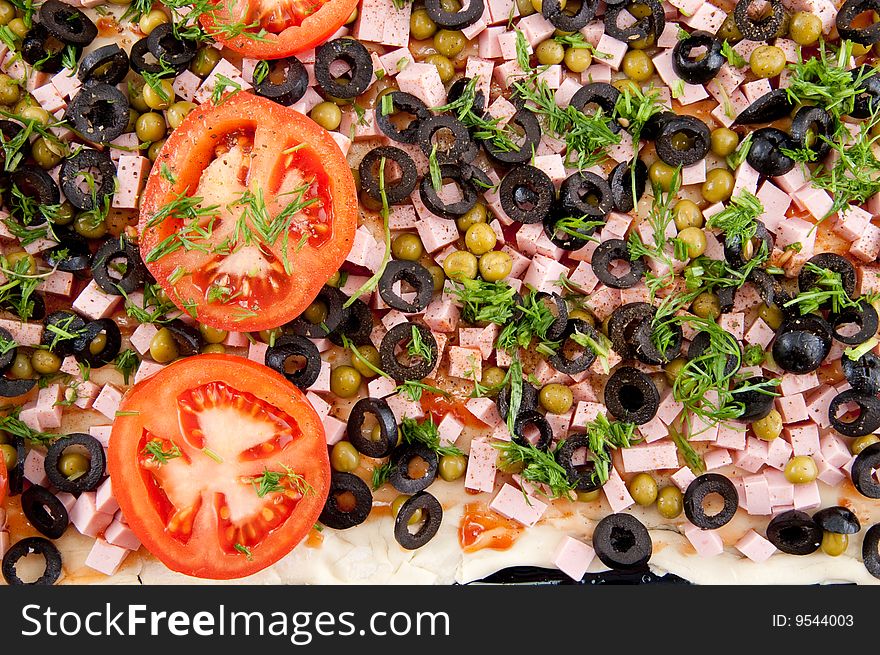 Delicious pizza with olive and tomato