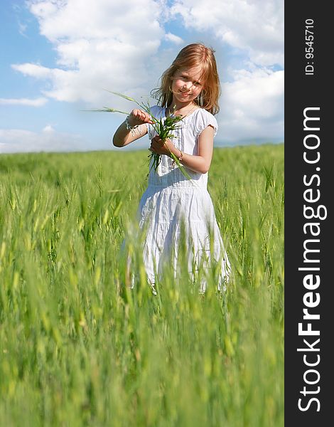 Girl in wheat field portrait