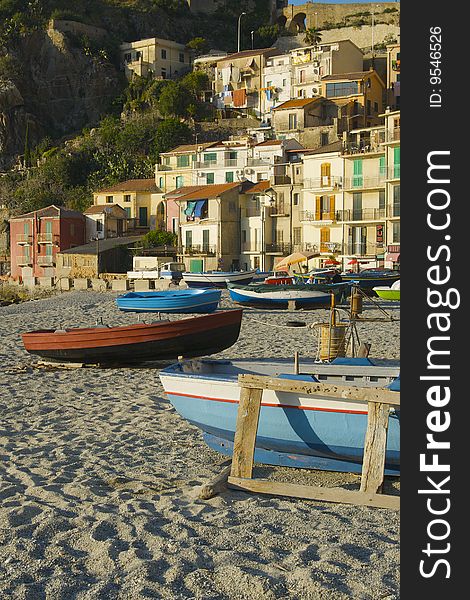 Great sea landscape of Scilla and boat. Sunset. Great sea landscape of Scilla and boat. Sunset