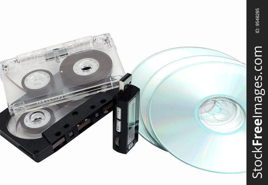 Audiocassettes,cd discs and mp3 player isolated on white