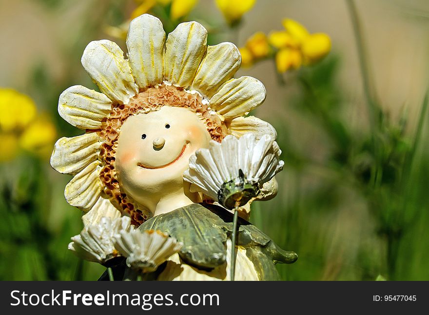 Sunflower With Face Figurine