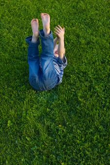 Boy Lies On A Grass Royalty Free Stock Photo Boy Lies On A Grass Royalty Free Stock Photo