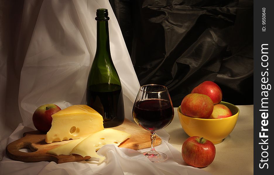 Still life with wine and cheese. Still life with wine and cheese