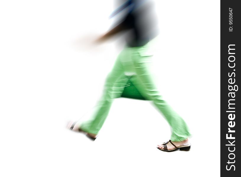 Pedestrian in blurry motion on white. Pedestrian in blurry motion on white