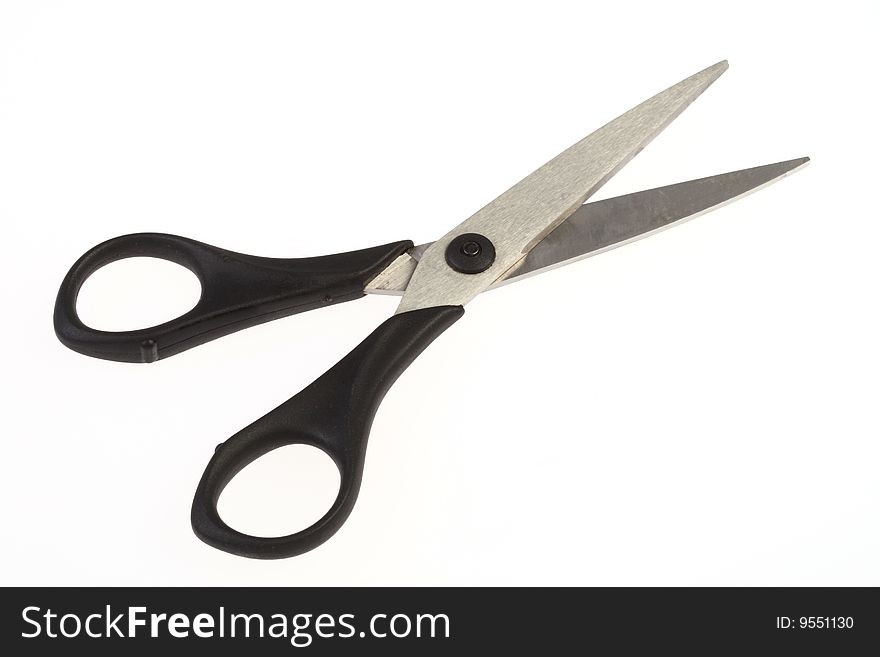 A pair of aluminum scissors on white background