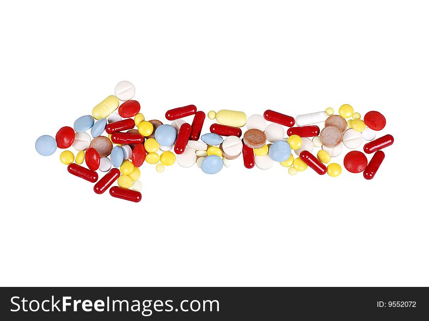 Isolated arrow of pills on white background