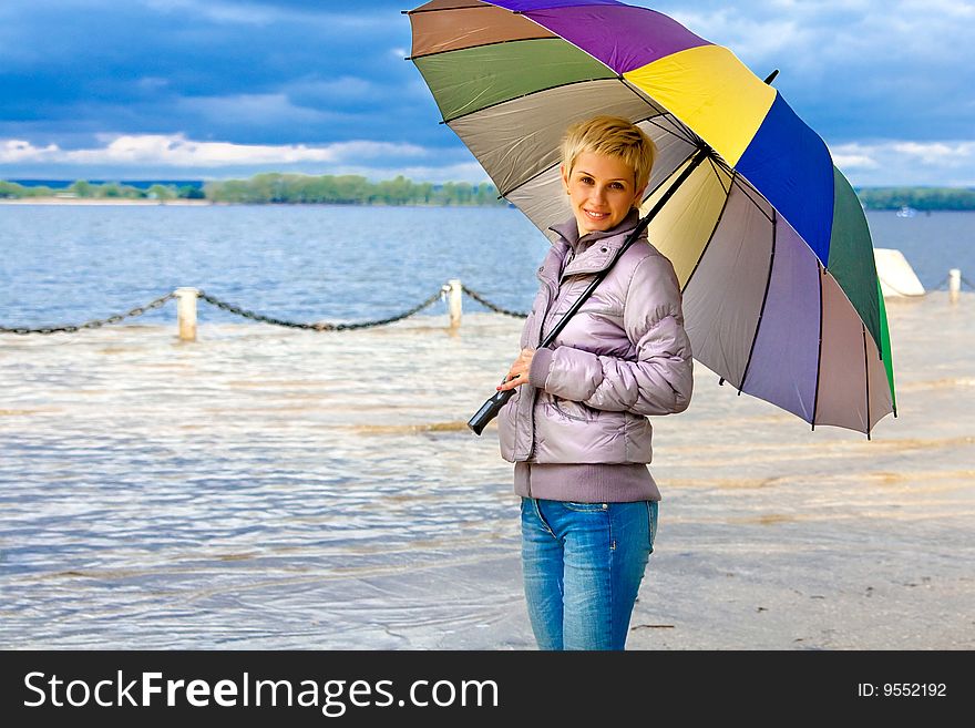 GIRL WITH multi-colour UMBRELLA. GIRL WITH multi-colour UMBRELLA