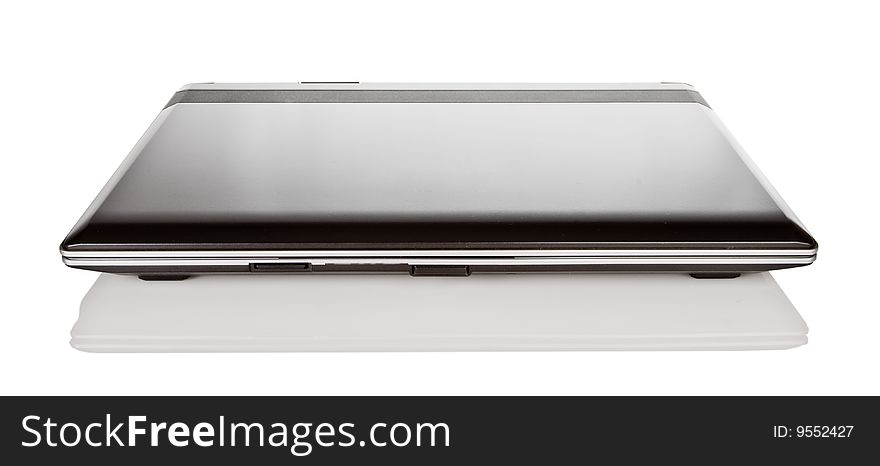 Isolated closed black laptop with reflection. Isolated closed black laptop with reflection