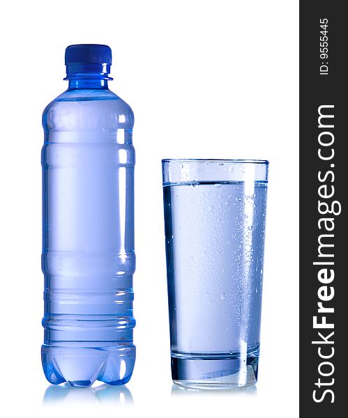 A bottle of water with glass on white background. A bottle of water with glass on white background