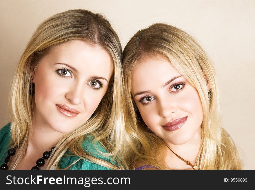Two beautiful young blond sisters