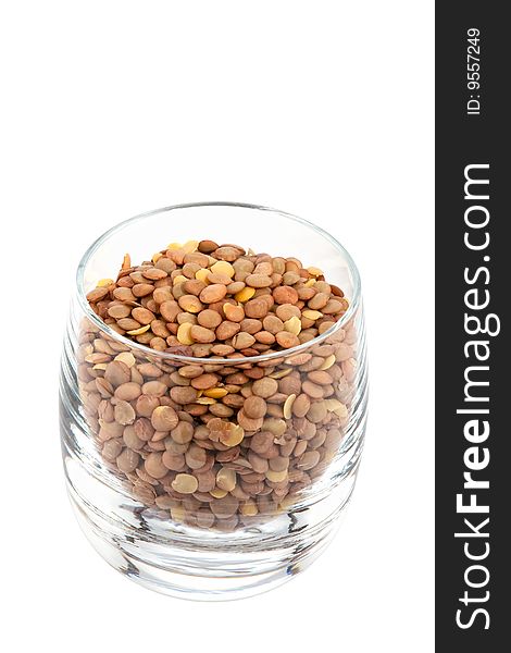 Lentils in glass, white background