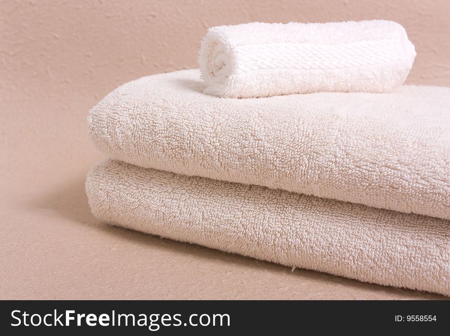 towels on a beoge backgrpund