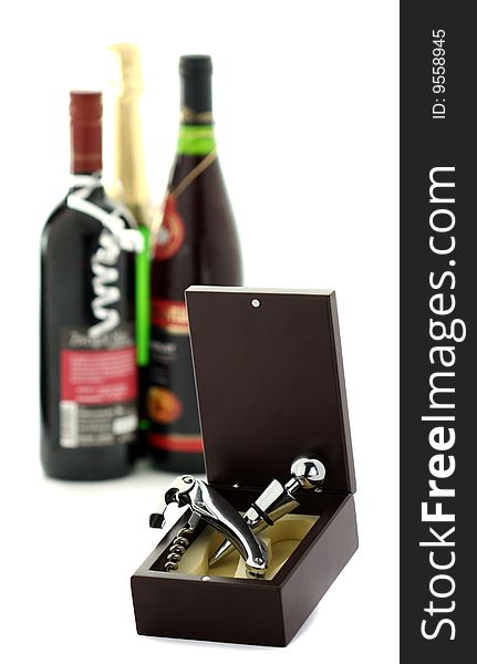 Box with cork and wine opener isolated on white background