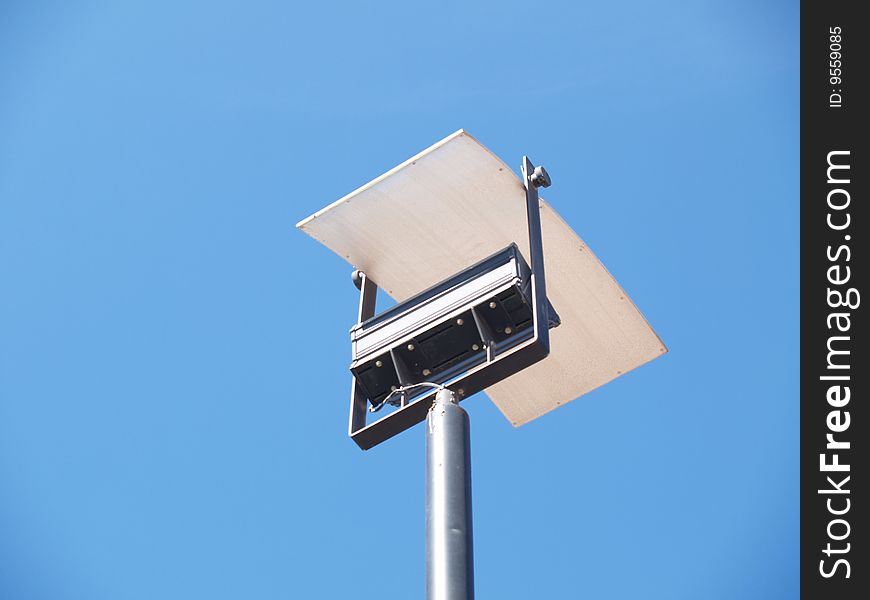 Parking lot lamp on blue sky background. Parking lot lamp on blue sky background