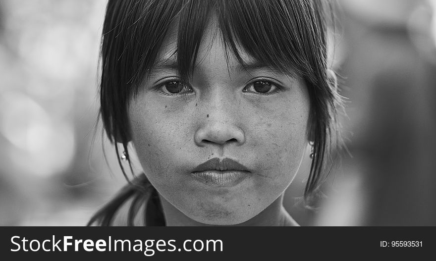 A monochrome portrait of a young girl. A monochrome portrait of a young girl.
