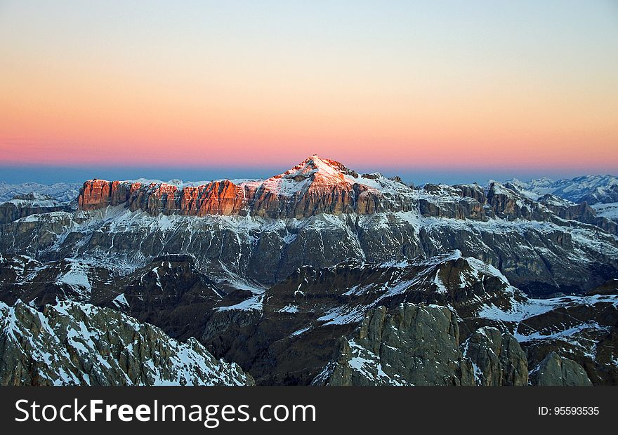 View of Snow Covered Mountain during Sunset