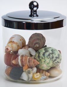 Jar Of Seashells Stock Photos