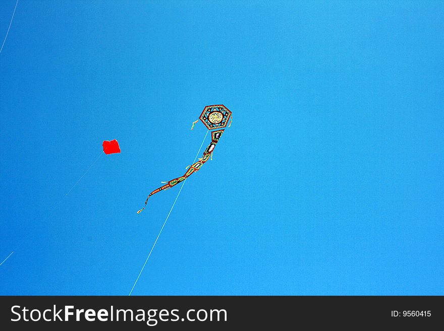 Kites flying on blue summer sky. Italy, Island of Sicily. Kites flying on blue summer sky. Italy, Island of Sicily