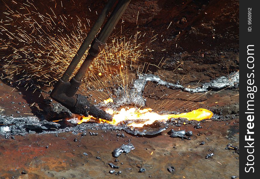 Close up of a torch cutting steel. Close up of a torch cutting steel