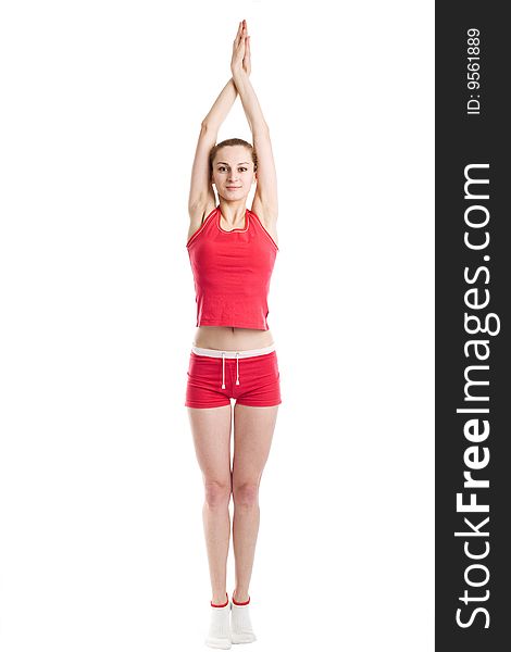 Blond girl doing gymnastic exercises