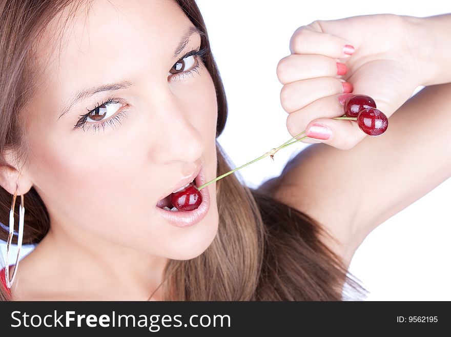 portrait of attractive woman holding cherry isolated on white