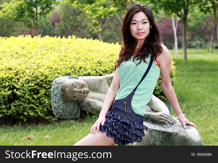 A modern asian girl outdoors. A modern asian girl outdoors.