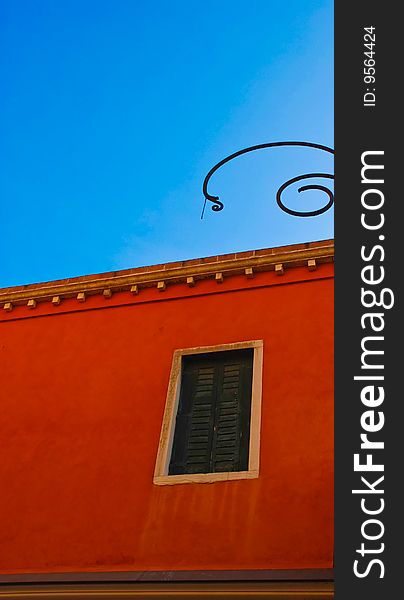 Red wall of an old building in Venice. Red wall of an old building in Venice