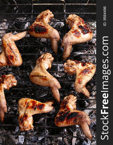 A chicken legs on the grill