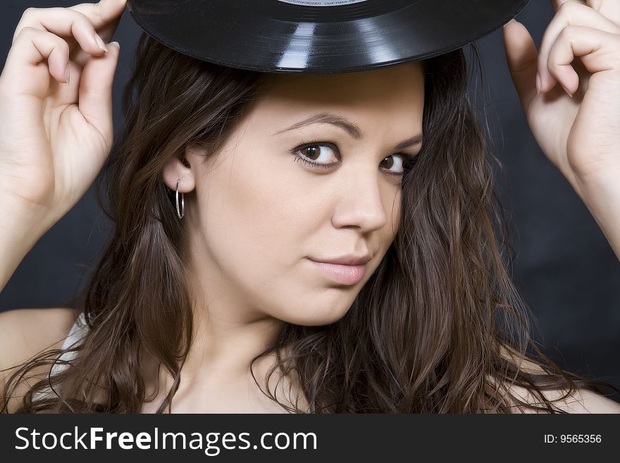 Expression Disco brunette girl with vinyl