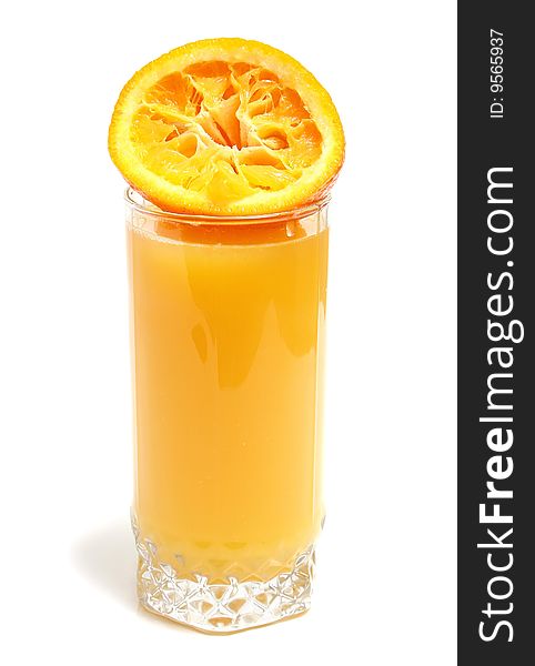 Orange and juice in glass isolated on white background