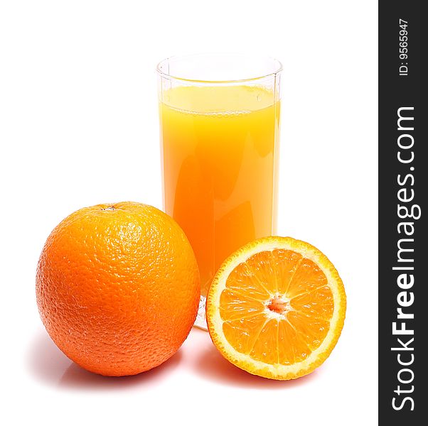 Orange and juice in glass isolated on white background