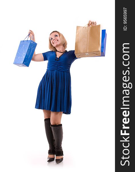 Happy beautiful young woman with shopping bags. Happy beautiful young woman with shopping bags