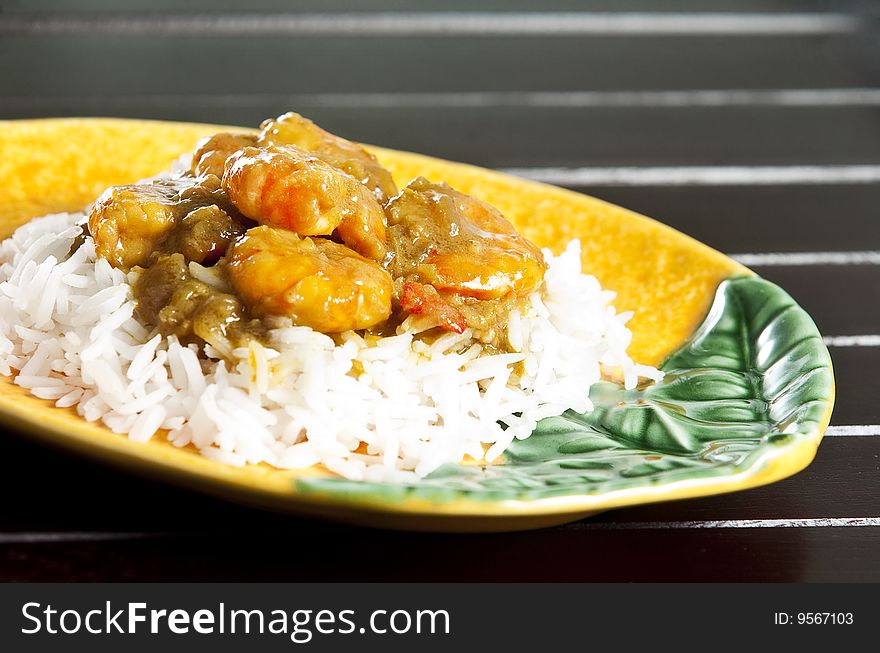 Prawn curry served with basmati rice