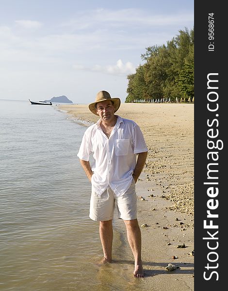 Handsome Man On A Beach