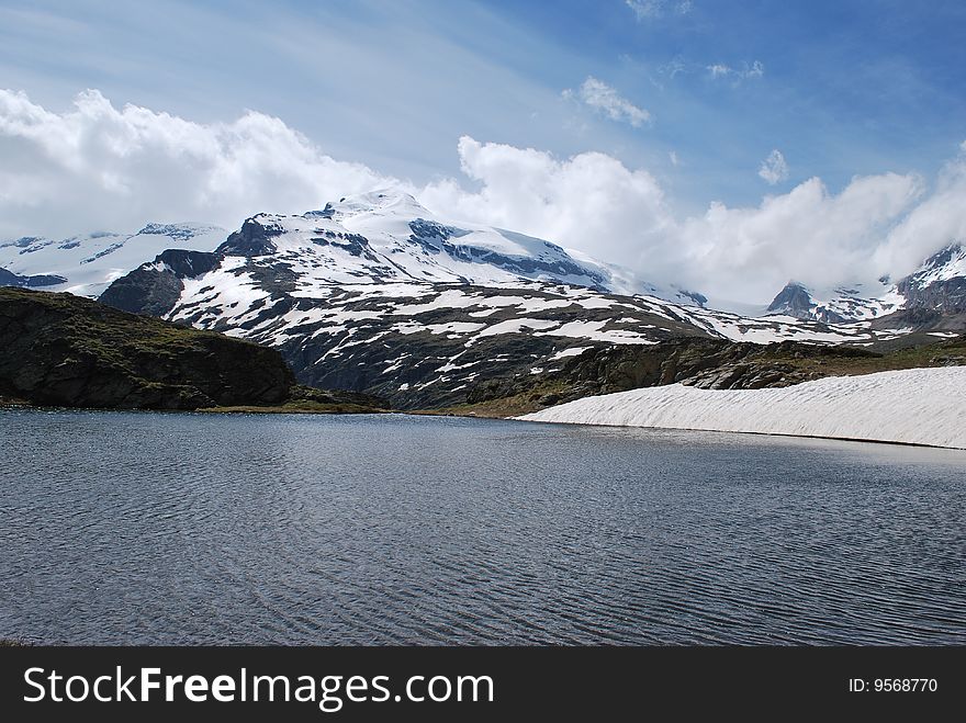Snow capped mountain and lake. Snow capped mountain and lake