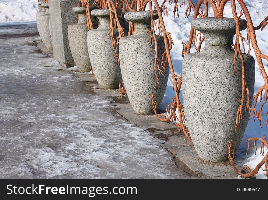 Four jugs with decorative branches