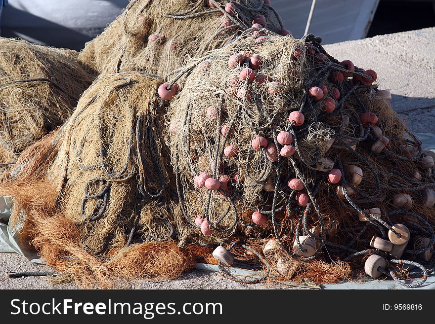 Fishing nets prepared to go fishing on a coast in Adriatic sea