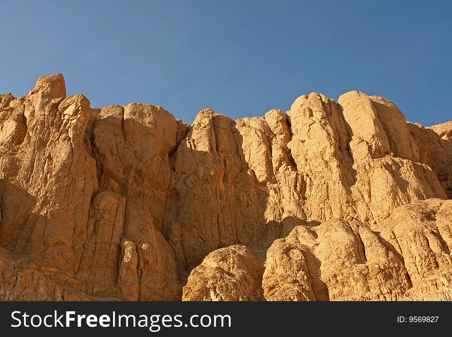 Sandstone rocks in desert under baking sun