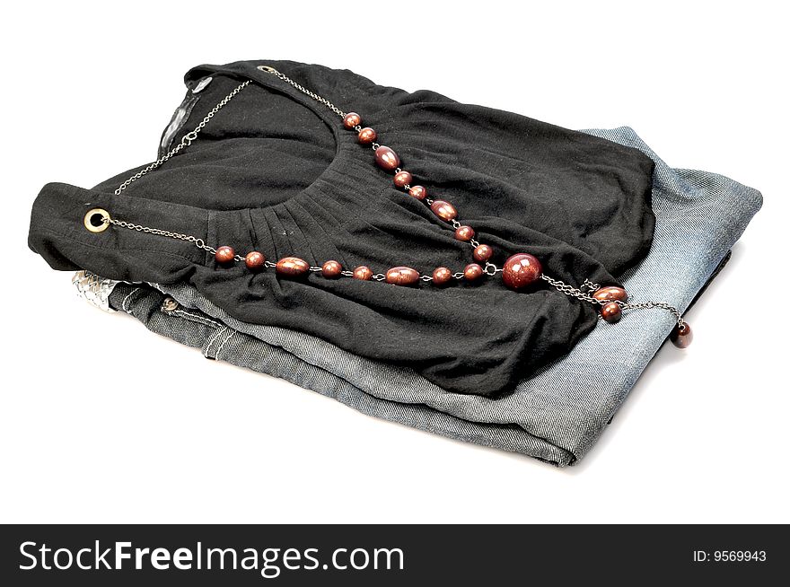 Top and jean with beads necklace isolated on white background.