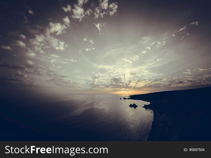 Sunset over the sea. Toned photo