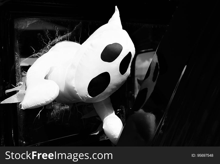 Cloth ghost toy in black and white.