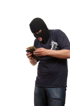 Robber Counts Money From Stolen Wallet. Royalty Free Stock Images