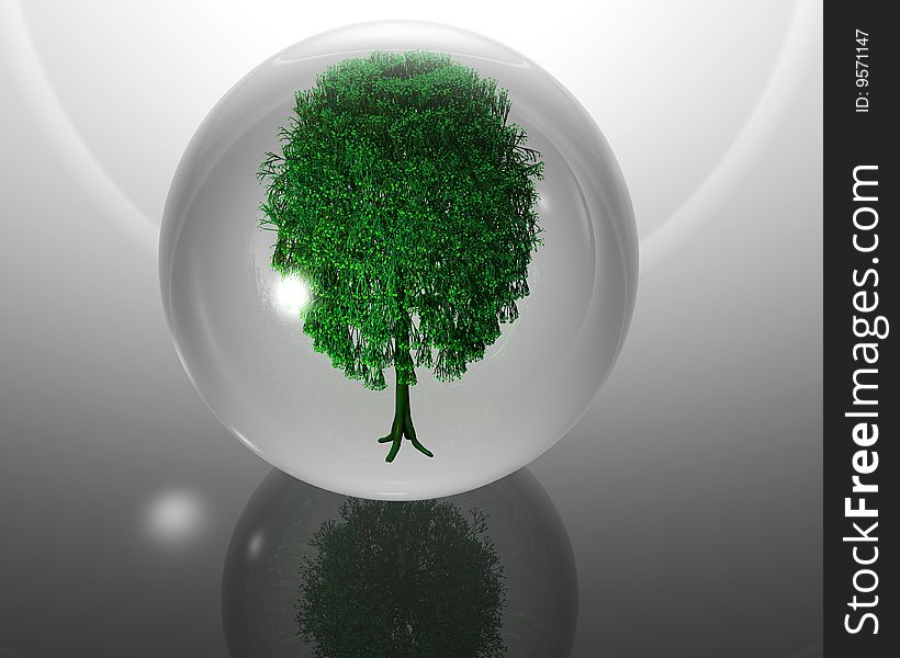 Green ecological tree in glass orb